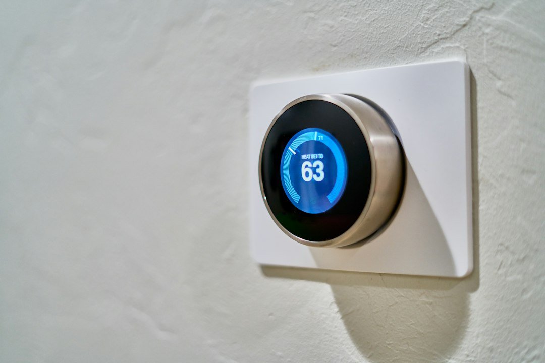 Wall-mounted thermostat that a resident can inspect before calling an AC technician