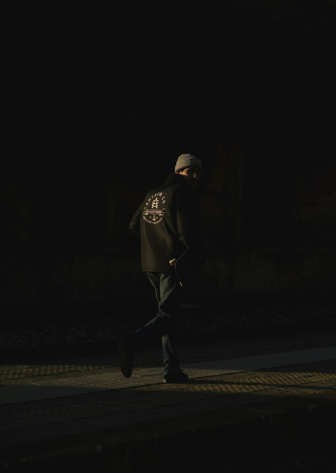 Editorial streetwear portrait at night